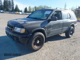 2000 Isuzu Rodeo z VIN 4S2DM58W8Y4348987, wystawiony jako IAAI lot #42024517 z przebiegiem 286 400 mil mil oraz . Historia ofert i sprzedaży dostępna na DreamBid. Obrazek 2.