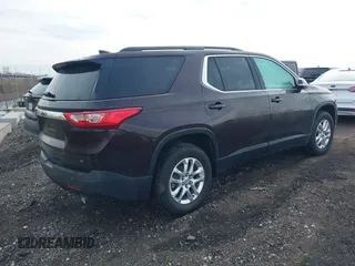 2021 Chevrolet Traverse LT Cloth with VIN 1GNEVGKW2MJ134615, listed as a IAAI auction lot 41667174 with 52,717 mi miles. Bid and sale history available at carsss.com. Image 4.