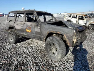 1996 Jeep Cherokee Sport with VIN 1J4FJ68S1TL279827, listed as a Copart auction lot 46613905 with 0 mi miles and Salvage Title. Bid and sale history available at carsss.com. Image 4.