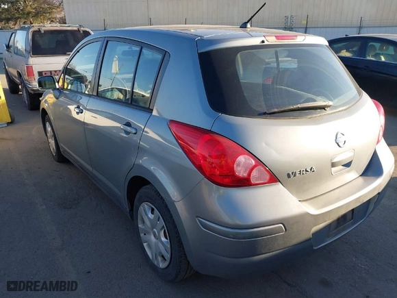 2010 Nissan Versa 1.8 S with VIN 3N1BC1CP1AL429587, listed as a IAAI auction lot 41604671 with 174,723 mi miles. Bid and sale history available at carsss.com. Image 3.