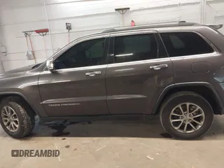2016 Jeep Grand Cherokee Limited with VIN 1C4RJFBG6GC327593, listed as a IAAI auction lot 42097841 with 141,189 mi miles and . Bid and sale history available at DreamBid. Image 14.