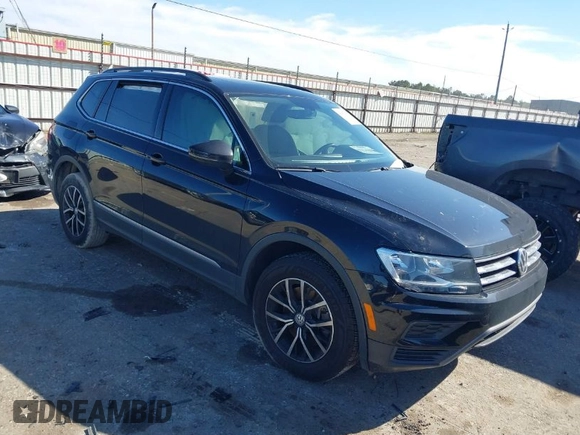 2021 Volkswagen Tiguan SE z VIN 3VV3B7AX4MM095811, wystawiony jako IAAI lot #41476490 z przebiegiem 25 668 mil mil oraz . Historia ofert i sprzedaży dostępna na DreamBid. Obrazek 1.