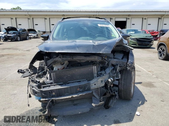 2013 Ford Escape SEL z VIN 1FMCU9HX1DUC17266, wystawiony jako Copart lot #63678025 z przebiegiem 196 206 mil mil oraz Szkoda całkowita • Salvage title. Historia ofert i sprzedaży dostępna na DreamBid. Obrazek 5.