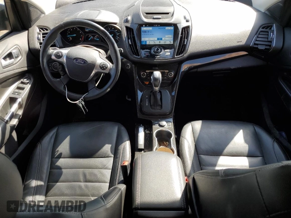 2016 Ford Escape Titanium with VIN 1FMCU0JX1GUA65239, listed as a Copart auction lot 49306785 with 124,658 mi miles and Salvage Title. Bid and sale history available at carsss.com. Image 8.