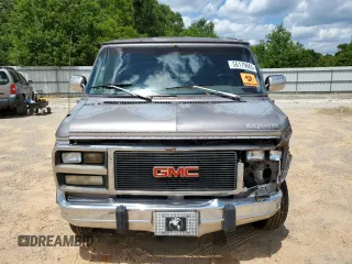 1993 GMC Vandura z VIN 1GDEG25KXPF515257, wystawiony jako Copart lot #56179665 z przebiegiem 308 324 mil mil oraz Szkody całkowita. Historia ofert i sprzedaży dostępna na DreamBid. Obrazek 5.