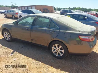 2007 Toyota Camry CE with VIN 4T1BE46K47U665377, listed as a IAAI auction lot 42133285 with 157,396 mi miles. Bid and sale history available at carsss.com. Image 3.