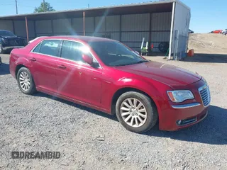 2014 Chrysler 300 with VIN 2C3CCAAG8EH138737, listed as a IAAI auction lot 41865365 with 205,854 mi miles. Bid and sale history available at carsss.com. Image 1.