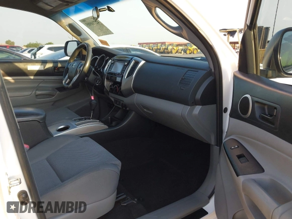 2014 Toyota Tacoma PreRunner with VIN 3TMJU4GN3EM160587, listed as a IAAI auction lot 42710985 with 200,867 mi miles and . Bid and sale history available at DreamBid. Image 5.