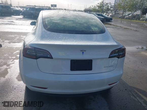 2021 Tesla Model 3 Long Range with VIN 5YJ3E1EB9MF055990, listed as a IAAI auction lot 41584065 with 49,147 mi miles and . Bid and sale history available at carsss.com. Image 17.