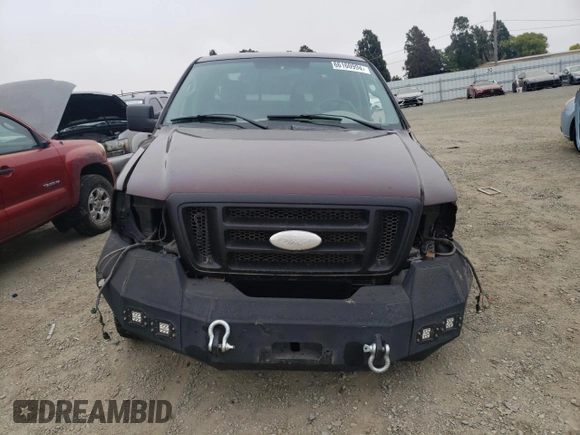 2005 Ford F-150 STX with VIN 1FTRX12W55KB45878, listed as a Copart auction lot 66160994 with 128,212 mi miles and Salvage Title. Bid and sale history available at carsss.com. Image 5.