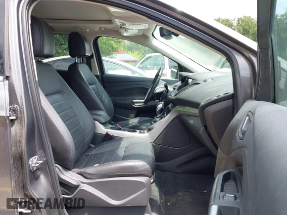 2013 Ford Escape SEL z VIN 1FMCU0H96DUC33699, wystawiony jako IAAI lot #42779073 z przebiegiem 120 992 mil mil oraz . Historia ofert i sprzedaży dostępna na DreamBid. Obrazek 5.