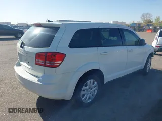 2015 Dodge Journey SE z VIN 3C4PDCAB4FT600293, wystawiony jako IAAI lot #41981386 z przebiegiem 143 573 mil mil oraz . Historia ofert i sprzedaży dostępna na DreamBid. Obrazek 4.