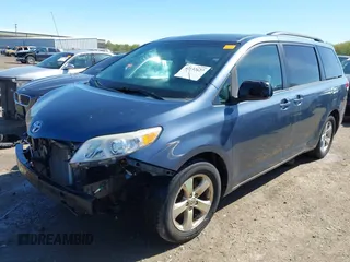 2014 Toyota Sienna LE AAS with VIN 5TDKK3DC4ES464647, listed as a IAAI auction lot 42132627 with 130,724 mi miles and . Bid and sale history available at DreamBid. Image 2.