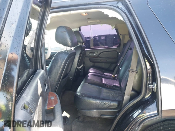 2011 GMC Yukon SLE with VIN 1GKS1AE01BR108215, listed as a IAAI auction lot 41379402 with 195,171 mi miles. Bid and sale history available at carsss.com. Image 8.