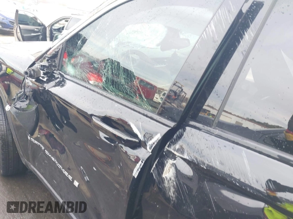 2023 Jeep Grand Cherokee Laredo with VIN 1C4RJHAG6PC671728, listed as a IAAI auction lot 40897386 with Not provided miles and . Bid and sale history available at DreamBid. Image 19.