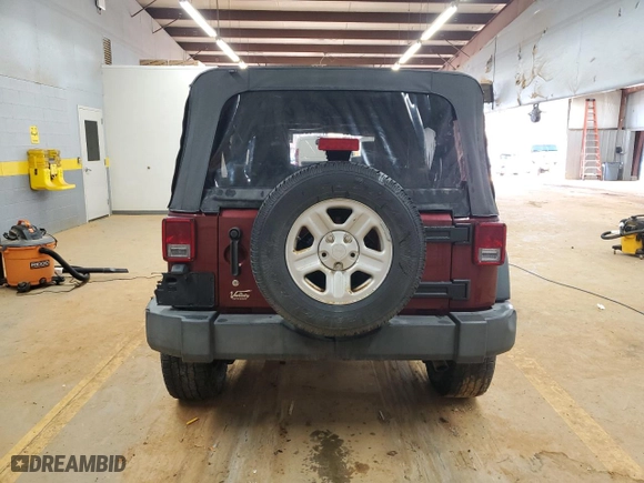 2009 Jeep Wrangler Unlimited X with VIN 1J4GA39149L704314, listed as a Copart auction lot 42699415 with 132,456 mi miles and Salvage Title. Bid and sale history available at carsss.com. Image 6.