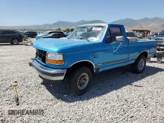 1995 Ford F-150 with VIN 1FTEF14N7SLB14630, listed as a Copart auction lot 60528215 with 212,614 mi miles and Salvage title. Bid and sale history available at DreamBid. Image 1.