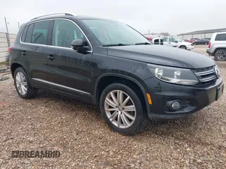 2015 Volkswagen Tiguan SE with VIN WVGAV7AX2FW506912, listed as a IAAI auction lot 41700584 with 120,120 mi miles and . Bid and sale history available at DreamBid. Image 1.