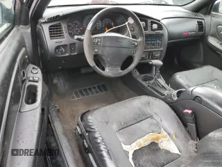 2000 Chevrolet Monte Carlo SS z VIN 2G1WX12K6Y9282312, wystawiony jako Copart lot #53240085 z przebiegiem 176 145 mil mil oraz Szkody całkowita. Historia ofert i sprzedaży dostępna na DreamBid. Obrazek 8.