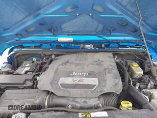2015 Jeep Wrangler Unlimited Sport with VIN 1C4BJWDG1FL716400, listed as a IAAI auction lot 42645745 with 83,199 mi miles and . Bid and sale history available at DreamBid. Image 10.