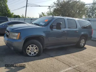2010 Chevrolet Suburban LS z VIN 1GNUKHE32AR212268, wystawiony jako Copart lot #57613895 z przebiegiem 294 117 mil mil oraz Szkoda całkowita • Salvage title. Historia ofert i sprzedaży dostępna na DreamBid. Obrazek 1.