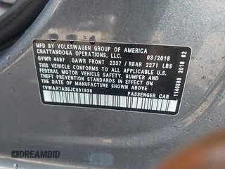 2018 Volkswagen Passat S z VIN 1VWAA7A35JC031938, wystawiony jako IAAI lot #42001015 z przebiegiem 109 450 mil mil oraz . Historia ofert i sprzedaży dostępna na DreamBid. Obrazek 9.