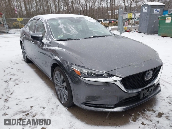 2019 Mazda 6 Grand Touring with VIN JM1GL1TYXK1505988, listed as a IAAI auction lot 41520952 with 70,032 mi miles and . Bid and sale history available at carsss.com. Image 1.