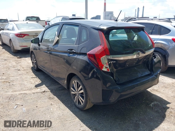 2015 Honda Fit EX-L with VIN 3HGGK5H88FM757753, listed as a IAAI auction lot 42096497 with 121,863 mi miles and . Bid and sale history available at DreamBid. Image 3.