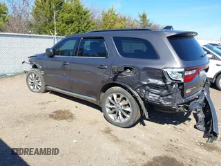 2021 Dodge Durango SXT with VIN 1C4RDHAG9MC761880, listed as a IAAI auction lot 41661298 with 73,171 mi miles and . Bid and sale history available at DreamBid. Image 14.