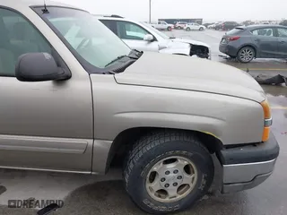 2003 Chevrolet Silverado 1500 LS with VIN 2GCEC19T131395606, listed as a IAAI auction lot 41969804 with 273,611 mi miles. Bid and sale history available at carsss.com. Image 6.