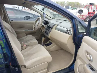 2007 Nissan Versa 1.8 SL with VIN 3N1BC11E67L420474, listed as a IAAI auction lot 41887735 with 199,094 mi miles. Bid and sale history available at carsss.com. Image 5.
