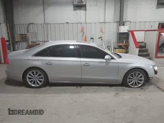 2011 Audi A8 with VIN WAURVAFD5BN014214, listed as a IAAI auction lot 41396044 with 131,764 mi miles and . Bid and sale history available at DreamBid. Image 14.
