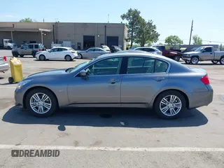 2015 Infiniti Q40 with VIN JN1CV6AP8FM580471, listed as a IAAI auction lot 42055612 with 64,494 mi miles. Bid and sale history available at carsss.com. Image 14.