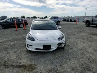 2021 Tesla Model 3 Long Range with VIN 5YJ3E1EB7MF874304, listed as a Copart auction lot 52652825 with Not Provided miles and Salvage Title. Bid and sale history available at carsss.com. Image 10.