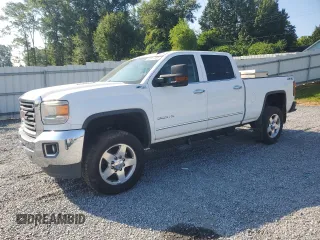 2015 GMC Sierra 2500HD SLT with VIN 1GT12ZE85FF633679, listed as a Copart auction lot 63912395 with 241,020 mi miles and Clean title. Bid and sale history available at DreamBid. Image 1.