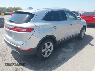 2015 Lincoln MKC with VIN 5LMCJ2A94FUJ16038, listed as a IAAI auction lot 42057400 with 102,848 mi miles. Bid and sale history available at carsss.com. Image 4.