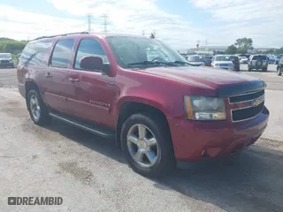 2007 Chevrolet Suburban LTZ with VIN 3GNFK16317G103758, listed as a IAAI auction lot 39784129 with 335,628 mi miles. Bid and sale history available at carsss.com. Image 1.