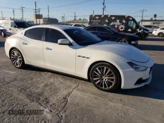 2015 Maserati Ghibli S Q4 with VIN ZAM57RTA3F1138060, listed as a Copart auction lot 74828063 with 73,536 mi miles. Bid and sale history available at carsss.com. Image 4.