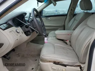 2011 Cadillac DTS with VIN 1G6KA5E63BU150750, listed as a Copart auction lot 43568135 with 100,117 mi miles and Salvage Title. Bid and sale history available at DreamBid. Image 7.