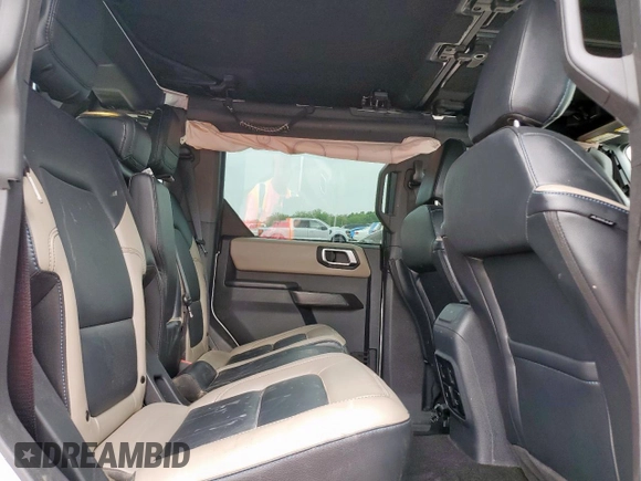 2024 Ford Bronco Wildtrak z VIN 1FMEE2BP4RLA19493, wystawiony jako Copart lot #57669545 z przebiegiem 12 065 mil mil oraz Szkoda całkowita • Salvage title. Historia ofert i sprzedaży dostępna na DreamBid. Obrazek 10.