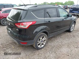 2014 Ford Escape SE with VIN 1FMCU9G9XEUD39077, listed as a IAAI auction lot 42205040 with 92,355 mi miles and . Bid and sale history available at DreamBid. Image 4.
