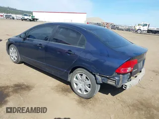 2007 Honda Civic Sdn LX with VIN 1HGFA16587L124463, listed as a IAAI auction lot 42042736 with 189,929 mi miles. Bid and sale history available at carsss.com. Image 3.