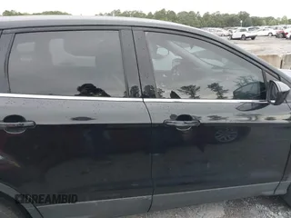 2014 Ford Escape SE with VIN 1FMCU0GX9EUB21853, listed as a IAAI auction lot 40313063 with 106,687 mi miles. Bid and sale history available at carsss.com. Image 13.