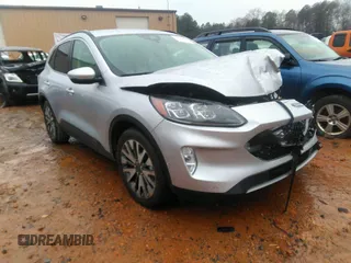 2020 Ford Escape Titanium Hybrid z VIN 1FMCU0DZ8LUB13911, wystawiony jako IAAI lot #41249498 z przebiegiem 64 108 mil mil oraz . Historia ofert i sprzedaży dostępna na DreamBid. Obrazek 1.