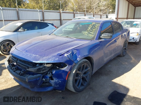 2019 Dodge Charger SXT with VIN 2C3CDXBG0KH588294, listed as a IAAI auction lot 41666566 with 113,874 mi miles. Bid and sale history available at carsss.com. Image 2.