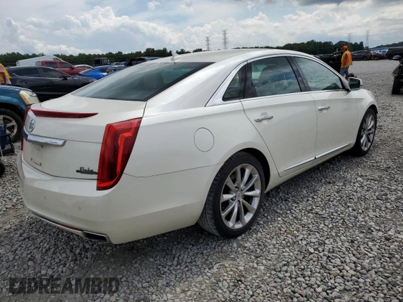 2013 Cadillac XTS Luxury with VIN 2G61P5S33D9125769, listed as a Copart auction lot 59671015 with 143,583 mi miles and Salvage title. Bid and sale history available at DreamBid. Image 3.