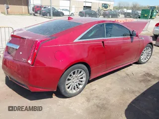 2014 Cadillac CTS Premium with VIN 1G6DD1E31E0120172, listed as a IAAI auction lot 41919738 with 104,744 mi miles and . Bid and sale history available at DreamBid. Image 4.