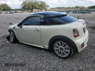 2012 MINI Coupe S z VIN WMWSX3C56CT154872, wystawiony jako Copart lot #68011264 z przebiegiem 91 650 mil mil oraz Szkody całkowita. Historia ofert i sprzedaży dostępna na DreamBid. Obrazek 2.