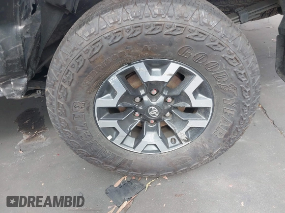2023 Toyota Tacoma SR with VIN 3TMCZ5AN0PM635933, listed as a IAAI auction lot 42543126 with 32,960 mi miles and . Bid and sale history available at DreamBid. Image 19.