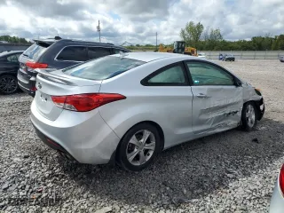 2013 Hyundai Elantra Coupe GS PZEV with VIN KMHDH6AE2DU023460, listed as a Copart auction lot 71382144 with 124,578 mi miles and Salvage Title. Bid and sale history available at carsss.com. Image 3.